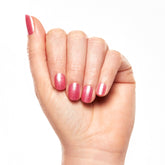 A close up fair skin model's nail shot wearing Salon Perfect Nail Lacquer .5oz 410 So Cheeky.